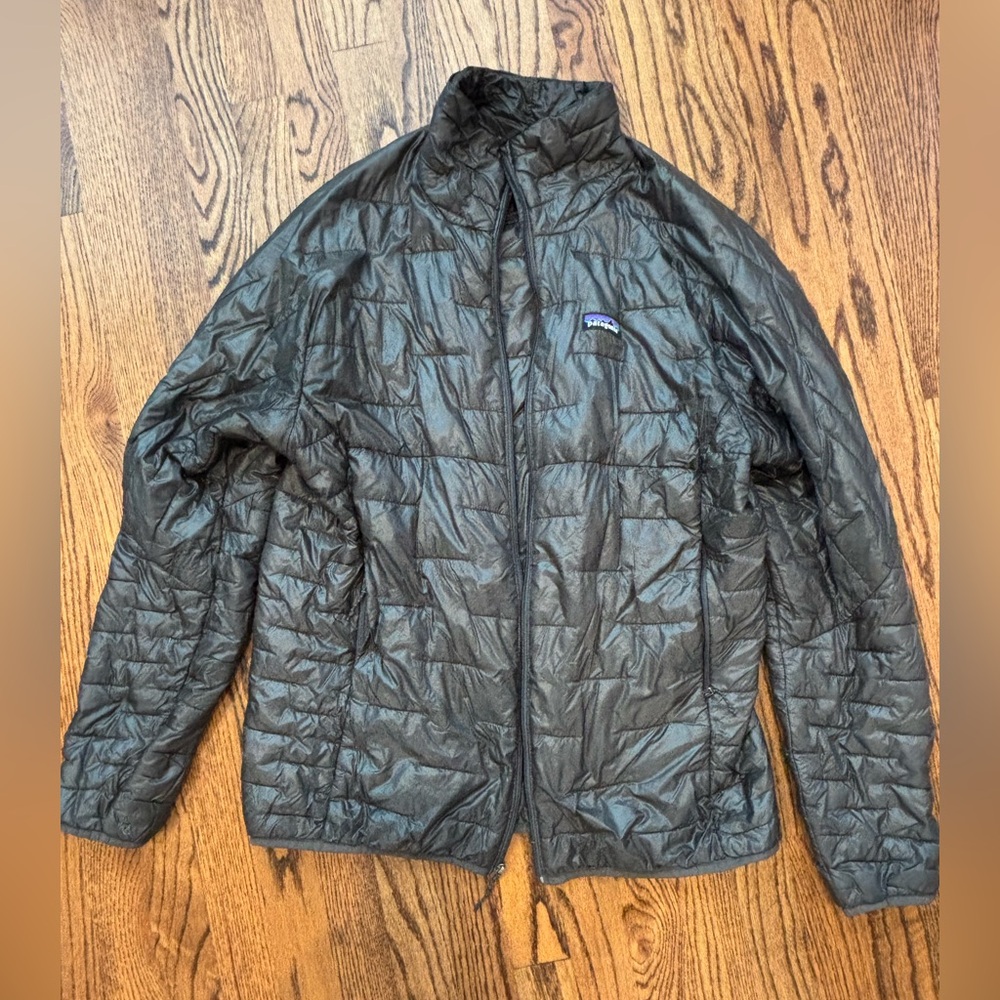 Patagonia Dark Gray Nano Puff Jacket in dark gray. Size: L
